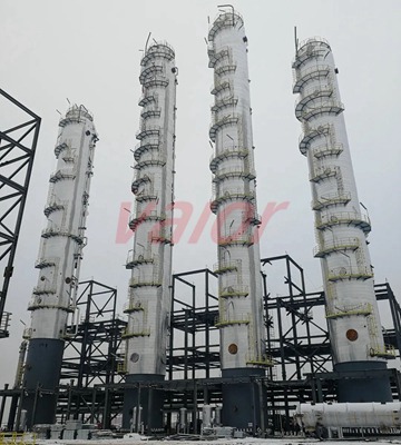 Industrial distillation tower used for purifying and refining crude oil into various petroleum products.