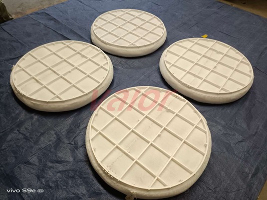 4 pieces of round PTFE mist eliminator are shown in this photo.